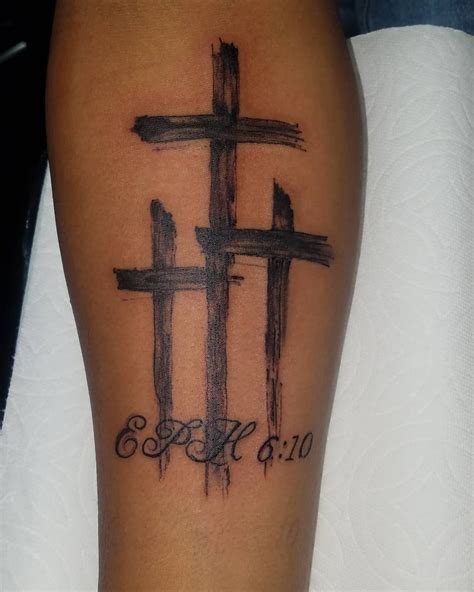 shoulder tattoos for men cross|catholic cross tattoos for men.